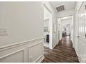 Bright hallway with hardwood floors leading to various rooms in the home at 27467 Cinderella Cir, Lancaster, SC 29720