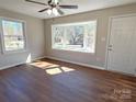 Bright living room featuring hardwood floors, natural light, and a large bay window at 3460 Hickory Pl, Salisbury, NC 28144