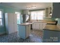 Bright kitchen featuring stainless steel appliances and an island at 802 Lewis St, Gastonia, NC 28054