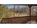 Lake view from the covered porch showing a dock on the water at 8749 Dog Leg Rd # 7, Sherrills Ford, NC 28673