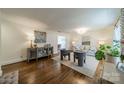 Spacious living room featuring hardwood floors, stylish furnishings, and natural light at 2501 Tanglewood Ln, Charlotte, NC 28211