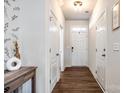 Bright entryway showcases hardwood floors and neutral walls at 5212 Spanish Ivy Ln, Indian Land, SC 29707