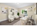 Bright home office featuring ample desk space and a comfortable seating area at 1323 Queens Rd # 218, Charlotte, NC 28207