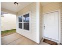 Welcoming porch featuring a neutral color scheme and double windows, creating an inviting entryway to the home at 5216 Crystal Lakes Dr, Rock Hill, SC 29732