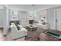 Bright, virtually staged living room featuring hardwood floors at 208 W Lafayette St, Salisbury, NC 28144