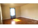 Bright bedroom with hardwood floors, showcasing natural light and a cozy atmosphere at 216 Park Ridge Rd, Albemarle, NC 28001