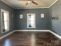Spacious living room featuring updated flooring, neutral wall color, and plenty of natural light at 3481 Roberta Rd, Concord, NC 28027