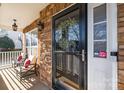 Cozy front porch with comfortable seating, decorative wreath, and a Ring doorbell for added security at 437 Buttermere Rd # 31, Fort Mill, SC 29715