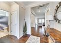 Bright entryway with wood floors, leading to the living spaces at 10014 Berkeley Castle Dr, Charlotte, NC 28273