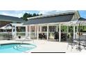 Beautiful community pool area with shaded seating, perfect for relaxation at 109 Stroupe Rd # E, Gastonia, NC 28056
