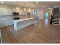 Spacious kitchen featuring stainless steel appliances, granite countertops, and island at 12027 Mariners Cove Ct # 381, Lancaster, SC 29720