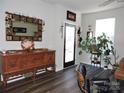 Bright foyer with hardwood floors, decorative mirror, and stylish furnishings at 1514 Robin Rd, Newton, NC 28658
