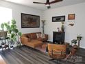 Cozy living room featuring contemporary decor, hardwood floors, and natural light at 1514 Robin Rd, Newton, NC 28658
