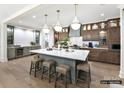 Spacious kitchen with modern appliances, a large island, and stylish lighting creates an inviting atmosphere at 19419 Youngblood W Rd # 2, Charlotte, NC 28278