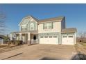Charming two-story home featuring a three car garage, covered porch and a combination of siding at 5024 Grace View Dr, Pineville, NC 28134