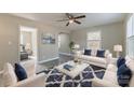 Bright living room with stylish furniture, decor and ample natural light, perfect for relaxing or entertaining at 2708 Catalina Ave, Charlotte, NC 28206