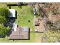 Aerial view showcasing a backyard featuring a detached garage and a shed, perfect for outdoor activities at 4937 Lebanon Dr # 1, Charlotte, NC 28273