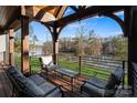 Relaxing outdoor space with comfortable seating and peaceful water views at 826 Misty Arbor Frd, Clover, SC 29710