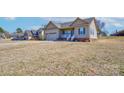 Charming single-Gathering home with a two-car garage and lawn at 1529 Alex Dr, Shelby, NC 28152