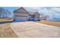 Charming single-Gathering home with a two-car garage and long driveway at 1529 Alex Dr, Shelby, NC 28152