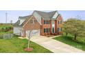 Charming two-story home with a two-car garage and well-maintained lawn at 1919 46Th Avenue Ne Dr # 46, Hickory, NC 28601