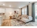 Bright living room features contemporary decor, stylish furniture, and sliding glass doors to the outdoor space at 296 Laura Elizabeth Ln, Clover, SC 29710