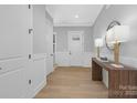 Bright entryway with hardwood floors and modern decor at 3924 13Th Ne St, Hickory, NC 28601