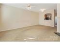 Spacious living room with neutral carpeting and ample natural light at 831 Lacebark Dr, Rock Hill, SC 29732