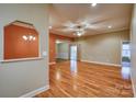 Spacious living room featuring hardwood floors, a ceiling fan, and an open-concept layout at 924 41St Avenue Ne Dr, Hickory, NC 28601