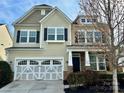 Charming two-story home with a two-car garage and well-maintained landscaping at 1019 Dunhill Ln, Waxhaw, NC 28173