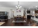 Inviting dining area featuring hardwood floors, chandelier, and ample space for entertaining at 1210 Croft Dr # 96, Fort Mill, SC 29708