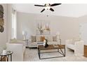 Comfortable living room with neutral furniture, decorative pillows, and stylish artwork at 2117 Gemway Dr, Charlotte, NC 28216