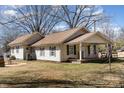 Spacious home with a covered front porch and a well-manicured front yard at 400 37Th Sw St, Hickory, NC 28602