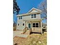 Charming two-story home with a light blue exterior and inviting front porch at 620 Granite Ave, Gastonia, NC 28052