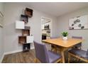 Dining room view showcases contemporary shelving and a glimpse into the kitchen at 825 21St Ne Ave, Hickory, NC 28601