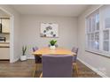 Bright dining area featuring stylish table setting and decor, complemented by a large window at 825 21St Ne Ave, Hickory, NC 28601