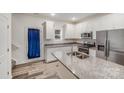 Modern kitchen featuring granite countertops, stainless steel appliances, and a central island at 834 N Flint St, Lincolnton, NC 28092