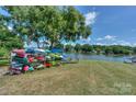 Backyard with kayak storage, leading to the lake at 107 Pier 33 Dr # 103, Mooresville, NC 28117