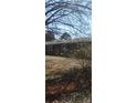 Exterior view of a well-maintained single-story brick home with classic design at 113 Lou Dr, Gastonia, NC 28052