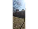 Exterior view of a well-maintained single-story brick home with classic design at 113 Lou Dr, Gastonia, NC 28052
