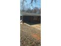 Exterior view of a well-maintained single-story brick home with classic design at 113 Lou Dr, Gastonia, NC 28052