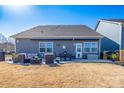 Cozy patio with comfortable seating and dining area, perfect for outdoor entertaining at 126 W Morehouse Ave, Mooresville, NC 28117