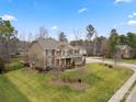 Expansive aerial view of the home showcasing its large yard, mature trees, and neighborhood setting at 3019 Foggy Hollow Ln, Clover, SC 29710