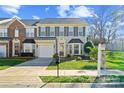 Charming two-story home with a well-manicured lawn and inviting curb appeal at 515 Blue Crush Ct, Rock Hill, SC 29732