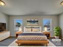 Staged main bedroom featuring soft lighting, two windows, and neutral decor at 8103 Idlewild Rd, Indian Trail, NC 28079