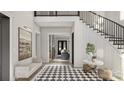 Bright foyer featuring checkerboard tile, staircase with black iron railing, and an abundance of natural light at 1025 Maxwell Ct # 7, Marvin, NC 28173