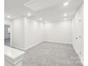 Bright bonus room with a neutral carpet, white walls and trim, and recessed lights, offering a flexible space at 114 Ciara Pl # C, Mooresville, NC 28117