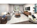 Bright and airy living room featuring a large sectional sofa, stylish decor, and a modern entertainment center at 114 Ciara Pl # C, Mooresville, NC 28117
