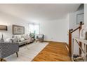 Sun-filled living room with hardwood floors, neutral decor, and a cozy atmosphere at 315 Wakefield Dr, Charlotte, NC 28209