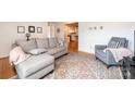 Cozy living room featuring hardwood floors, neutral tones, and a comfortable seating arrangement at 3415 23Rd Ne St, Hickory, NC 28601